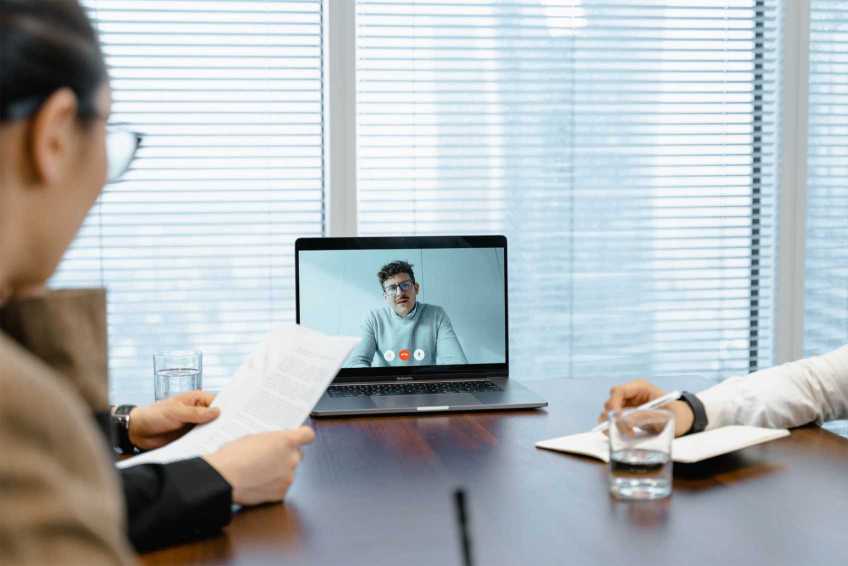 A virtual counselling session on a laptop