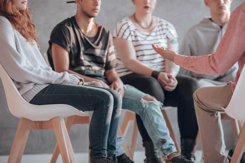 Young people getting a stern talking to